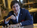 Карякин и Ананд вышли в лидеры шахматного Турнира претендентов в Москве